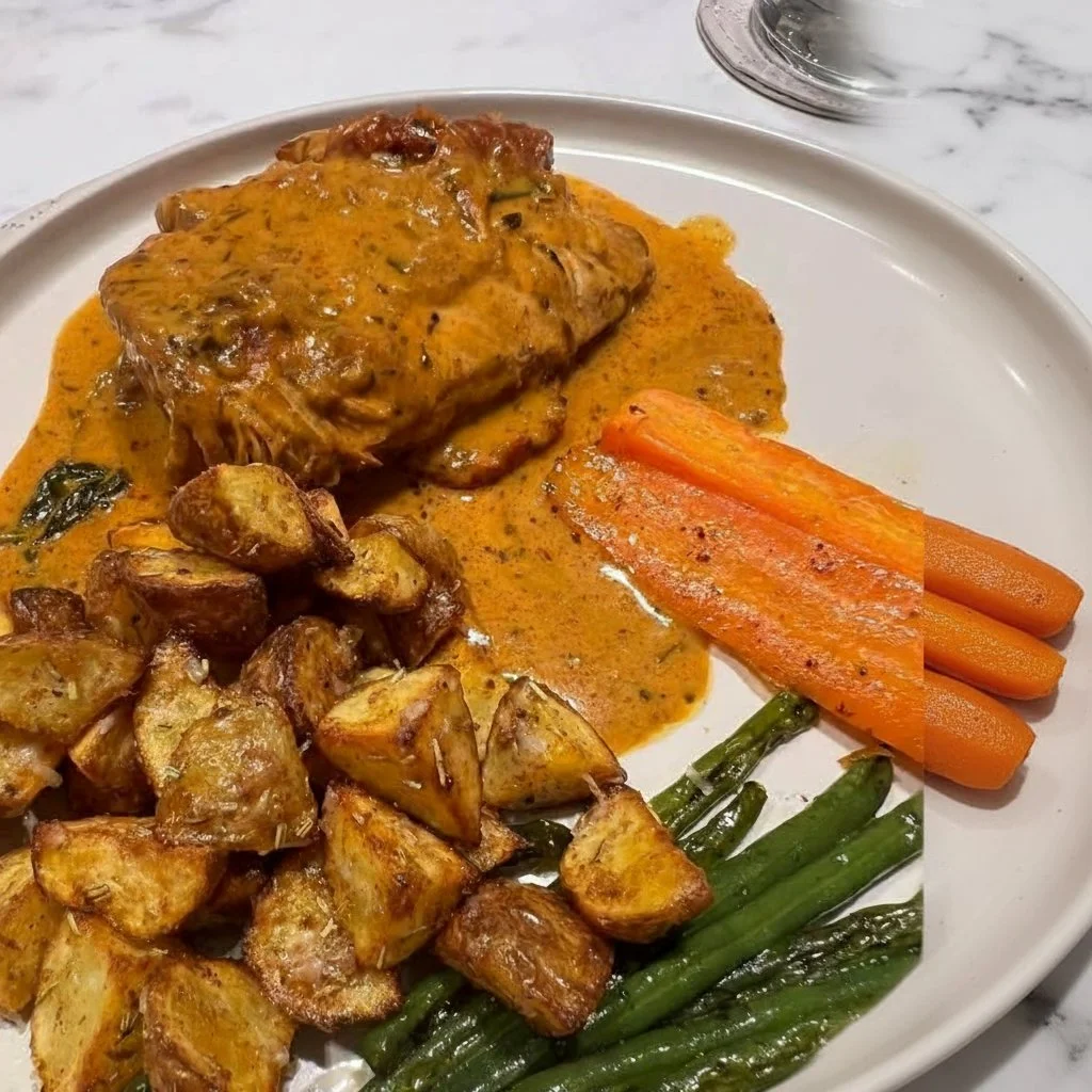Slow Cooker Marry Me Chicken served with crispy baby potatoes