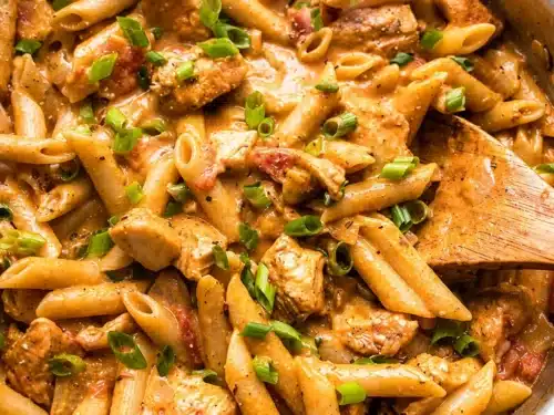 One-Pot Creamy Spicy Cajun Sausage Pasta with cheese and spices