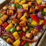 Hawaiian Chicken Sheet Pan meal with colorful vegetables and succulent chicken