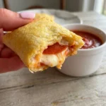 Delicious homemade Pepperoni Pizza Pockets with melted cheese and pepperoni filling