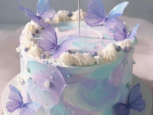 Beautiful butterfly themed cake with colorful decorations for celebrations