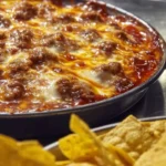 Fiery loaded cheese nachos topped with jalapeños and melted cheese