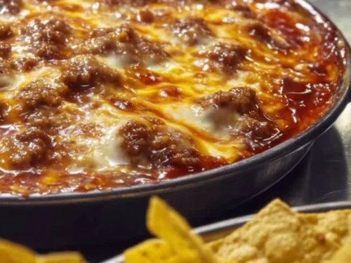 Fiery loaded cheese nachos topped with jalapeños and melted cheese