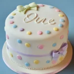 Colorful decorations and cake for a child's first birthday celebration at crimsoncake