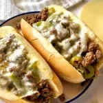 Quick and easy Ground Beef Philly Cheesesteak served with toppings