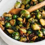 30-minute stovetop maple bacon Brussels sprouts with crispy bacon.